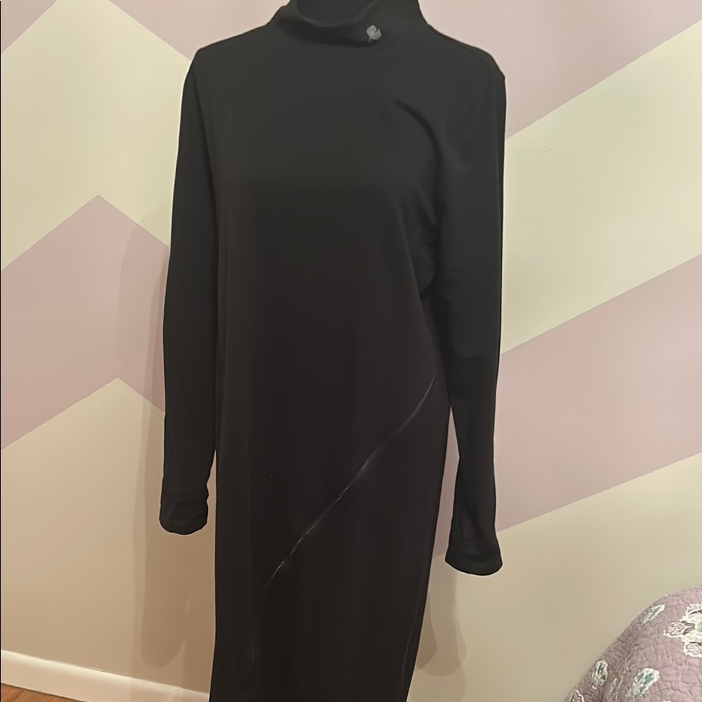 Black Sheath Dress with Mock Neck and Long Sleeves. Zipper slit